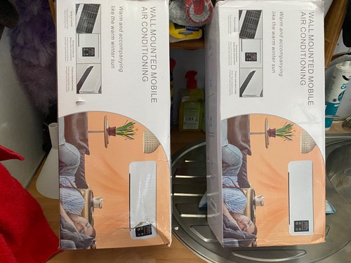 Wall mounted fan heater with